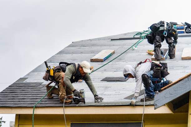 Professional Roof Replacement technician working in Tenafly, NJ